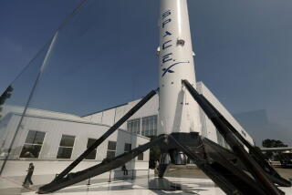 A SpaceX Falcon 9 rocket outside a SpaceX facility in Hawthorne, California on Aug. 4. Photographer: Justin Sullivan/Getty Images
