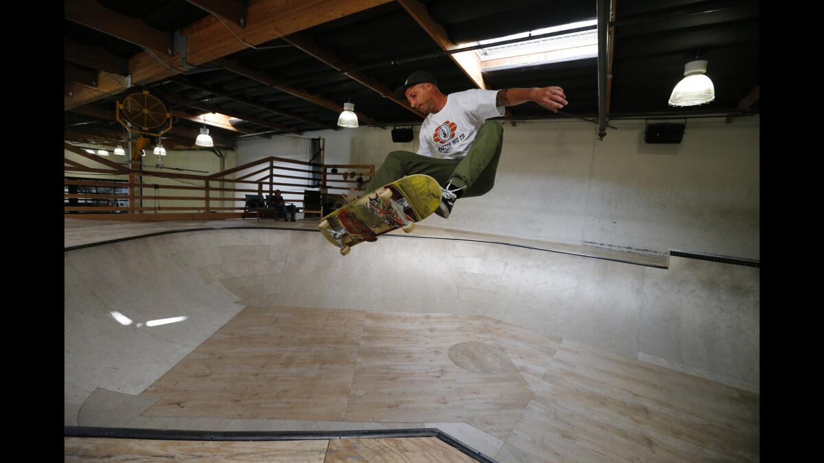 Brandon Christensen, senior designer, skateboards at Stance's skate bowl while taking an encouraged break from designing at the San Clemente office.