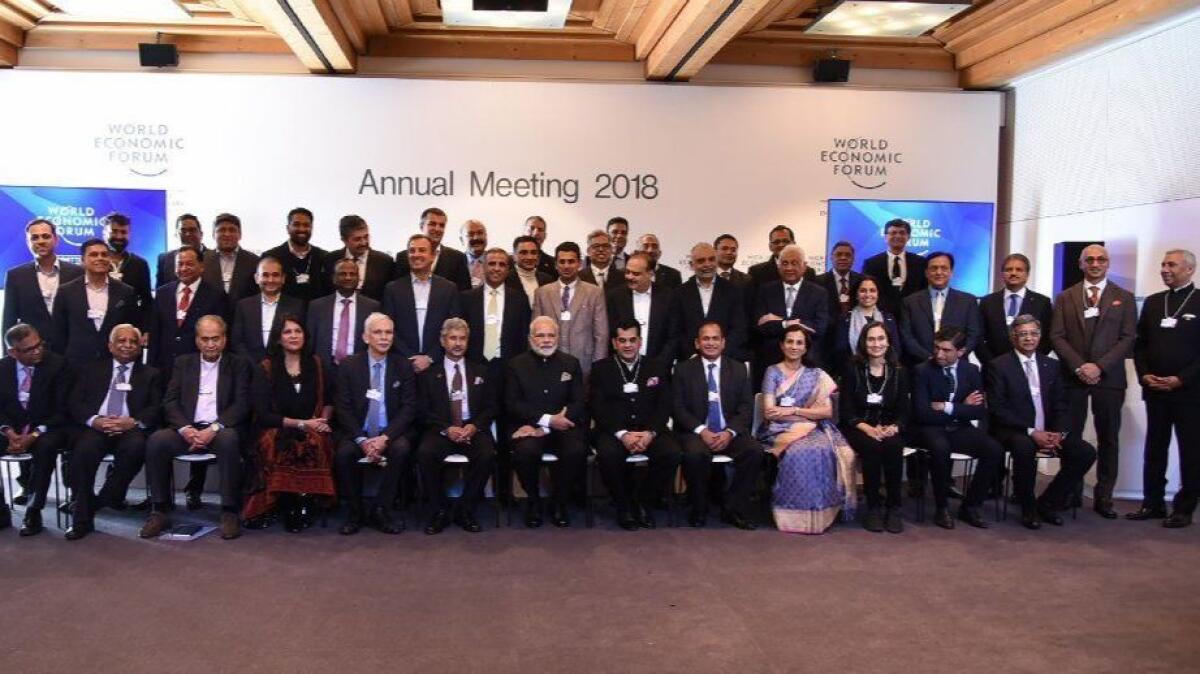 Indian executives including Nirav Modi, middle row, third from left, pose with Indian Prime Minister Narendra Modi, front row, center, at the World Economic Forum in Davos, Switzerland, last month.