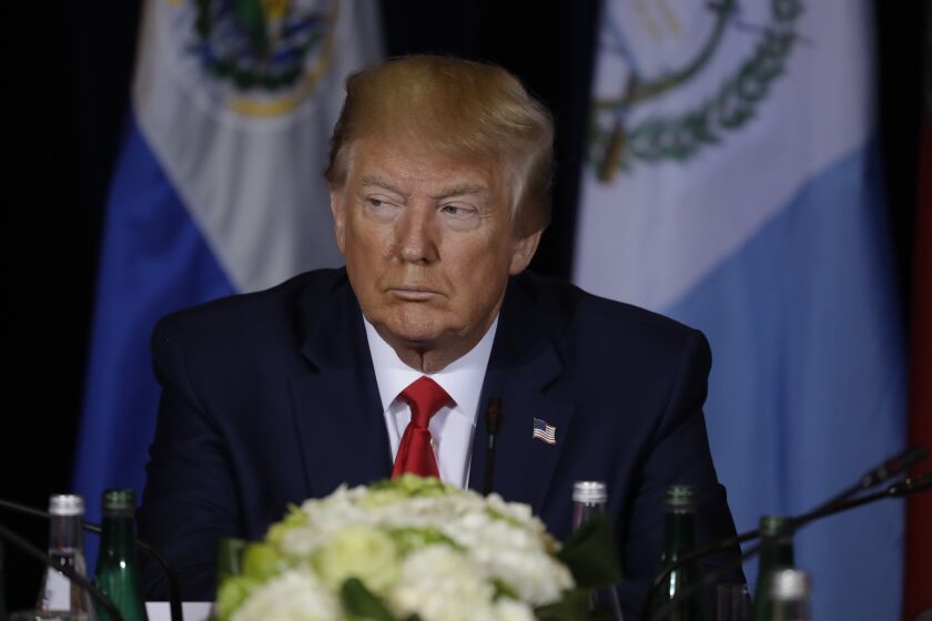 President Donald Trump listens during a multilateral meeting on Venezuela at the InterContinental New York Barclay hotel during the United Nations General Assembly, Wednesday, Sept. 25, 2019, in New York. (AP Photo/Evan Vucci)