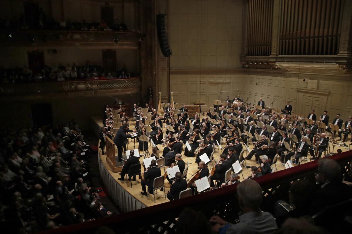 ARCHIVO - Andris Nelsons dirige un concierto conjunto entre la Orquesta Sinfónica de Boston 