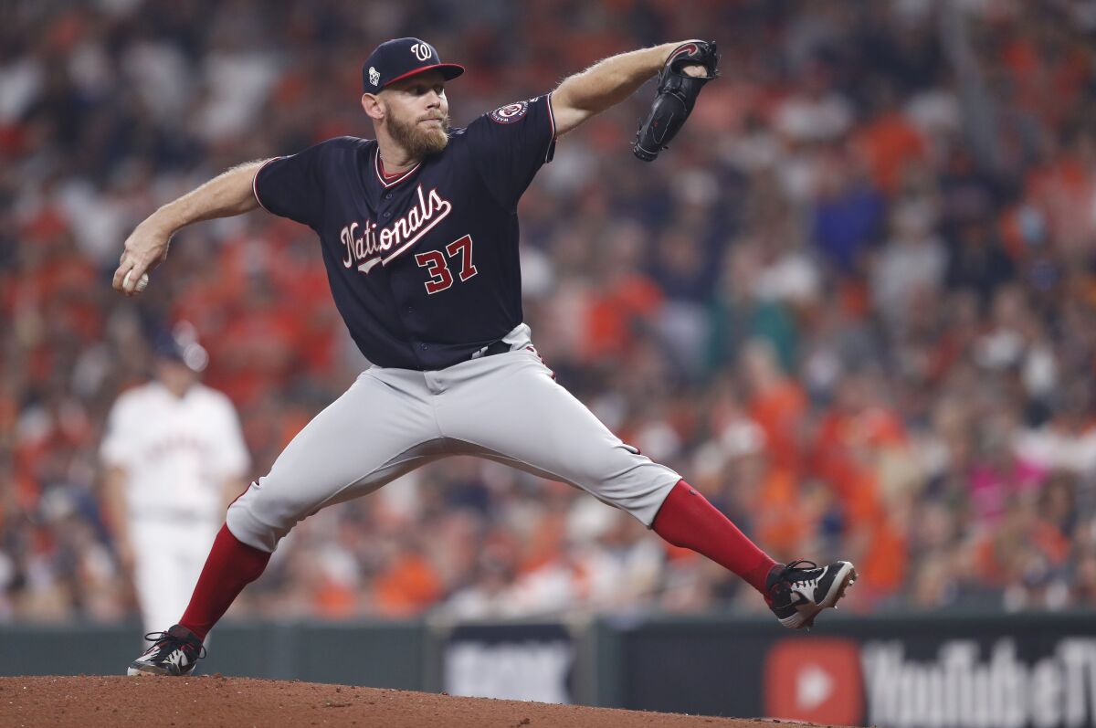Washington Nationals pitcher Stephen Strasburg throws against the Houston Astros in the bottom of the first inning of Game 2 of the World Series on Wednesday in Houston.