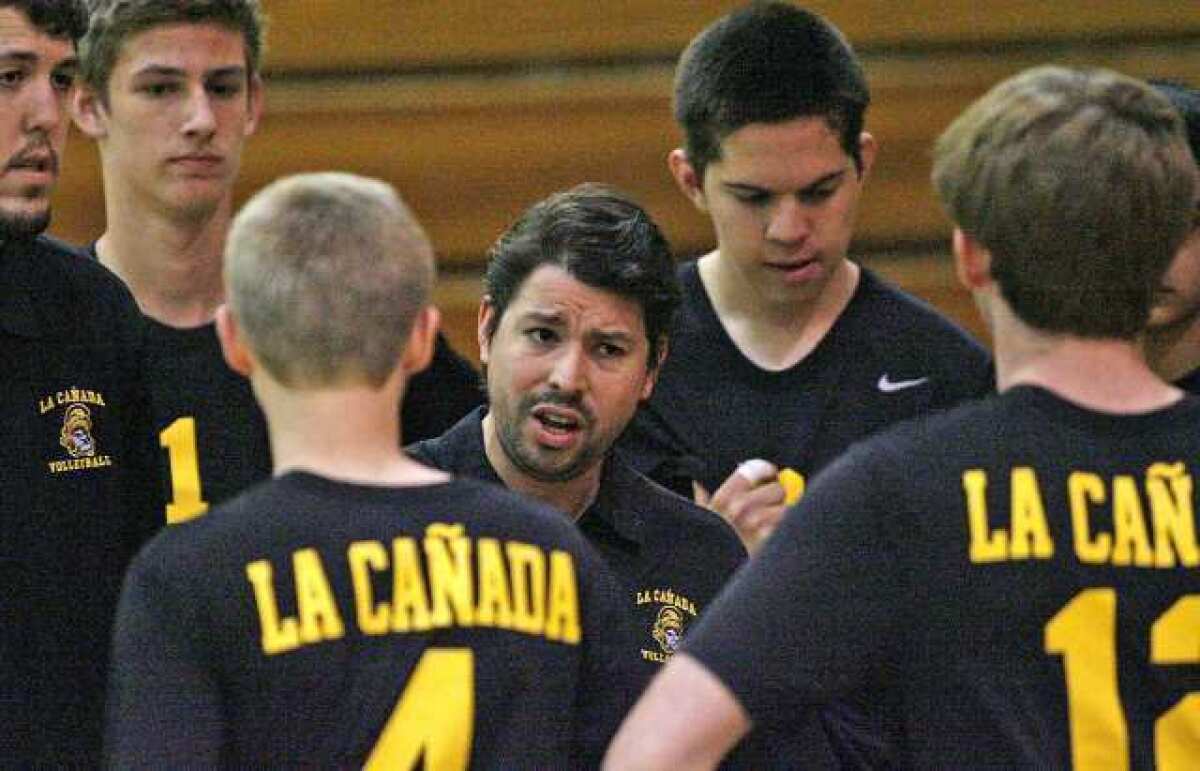 ARCHIVE PHOTO: La Cañada High boys' volleyball has qualified for the CIF Southern Section Division playoffs for the first time in three years under first-year coach Otto Lacayo, center.