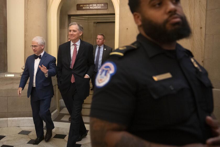 Speaker of the House pro tempore Rep. Patrick McHenry, R-N.C., left, leaves the Speaker's office on Capitol Hill, Wednesday, Oct. 4, 2023 in Washington. Walking with McHenry is Rep. French Hill, R-Ark. (AP Photo/Mark Schiefelbein)