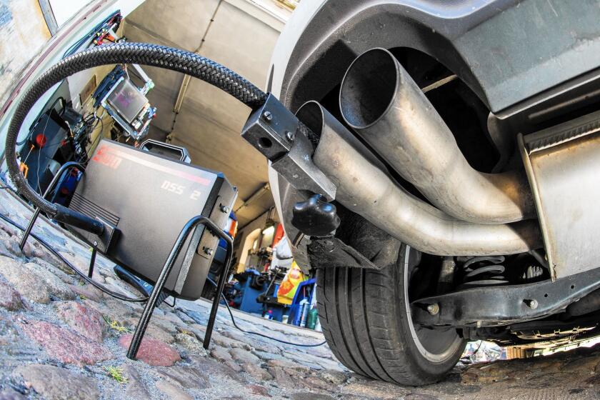 A Volkswagen Golf diesel undergoes an emissions inspection in Frankfurt an der Oder, Germany.