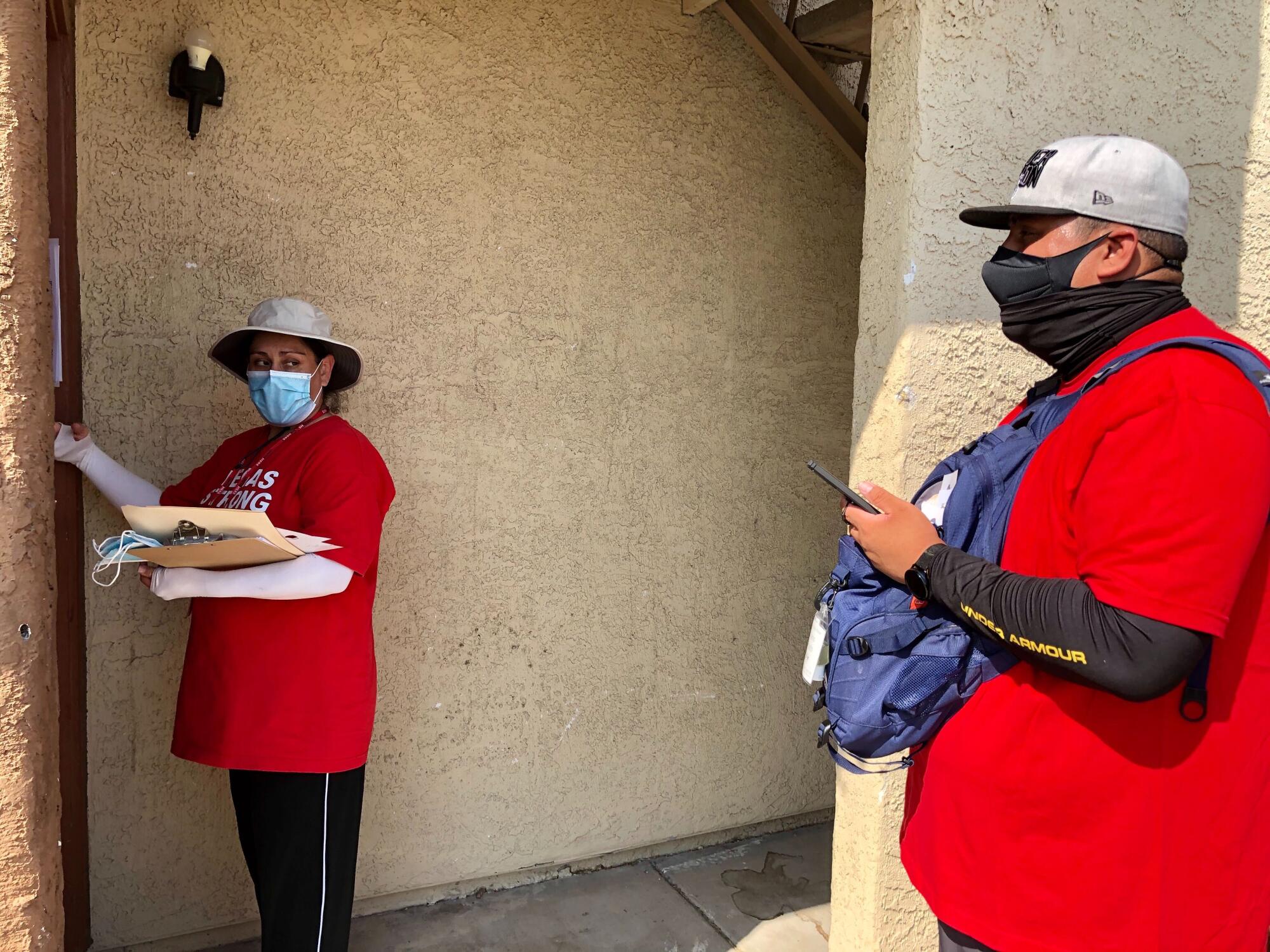 Members of the Culinary Union canvass door-to-door in Las Vegas in 2020 