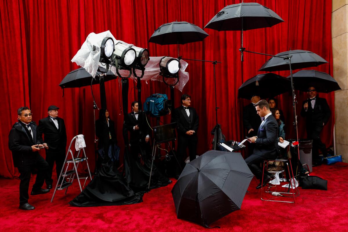 Parasite director Bong Joon Ho and cast members walking on the red carpet  at the 92nd Annual Academy Awards held at the Dolby Theatre in Hollywood,  California on Feb. 9, 2020. (Photo