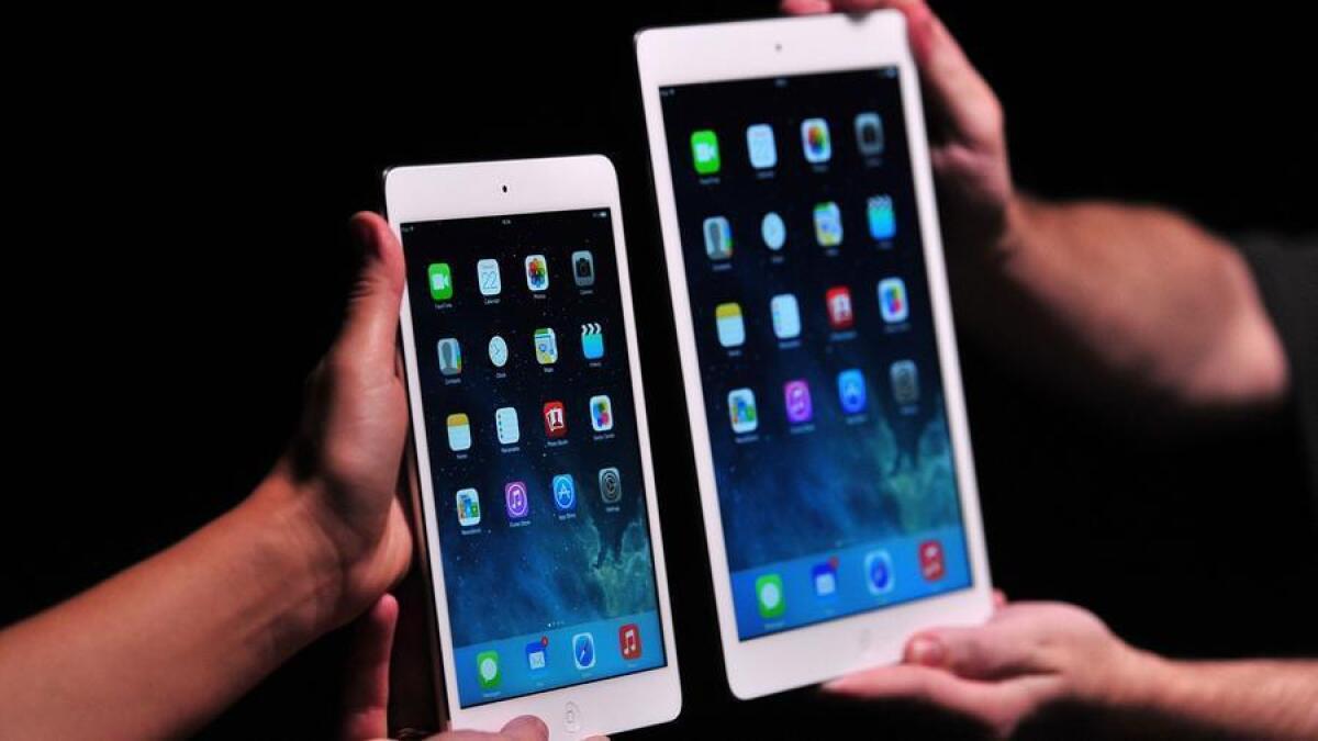 Tablet shipments continue to fall worldwide. Above, the iPad mini 2, at left, and its larger-screen counterpart.