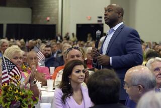 FILE - Republican presidential candidate Sen. Tim Scott, R-S.C., right, walks by Casey DeSantis, wife of GOP rival and Florida Gov. Ron DeSantis, center, as he speaks at Rep. Jeff Duncan's Faith & Freedom BBQ fundraiser on Monday, Aug. 28, 2023, in Anderson, S.C. Several campaigns are placing a huge emphasis on South Carolina, where the Republican primary is traditionally the last chance for many White House hopefuls to break through before Super Tuesday. (AP Photo/Meg Kinnard, File)