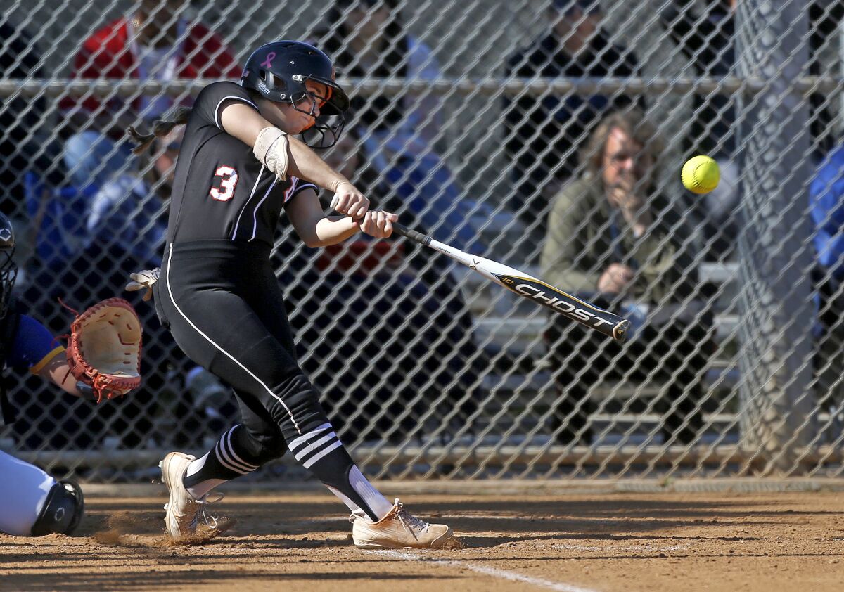 Sophia Knight of Huntington Beach hits a two-run single off the center field wall against Fountain Valley on Tuesday.