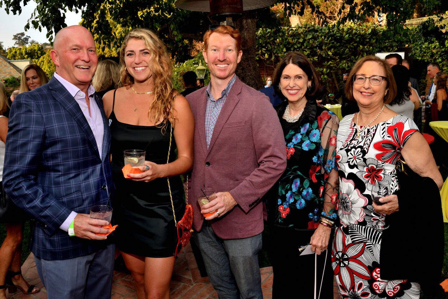Jay and Morgan Wurtzler, Brett Hassig, Ann Hill and Promises2Kids founder emeritus Renee Comeau