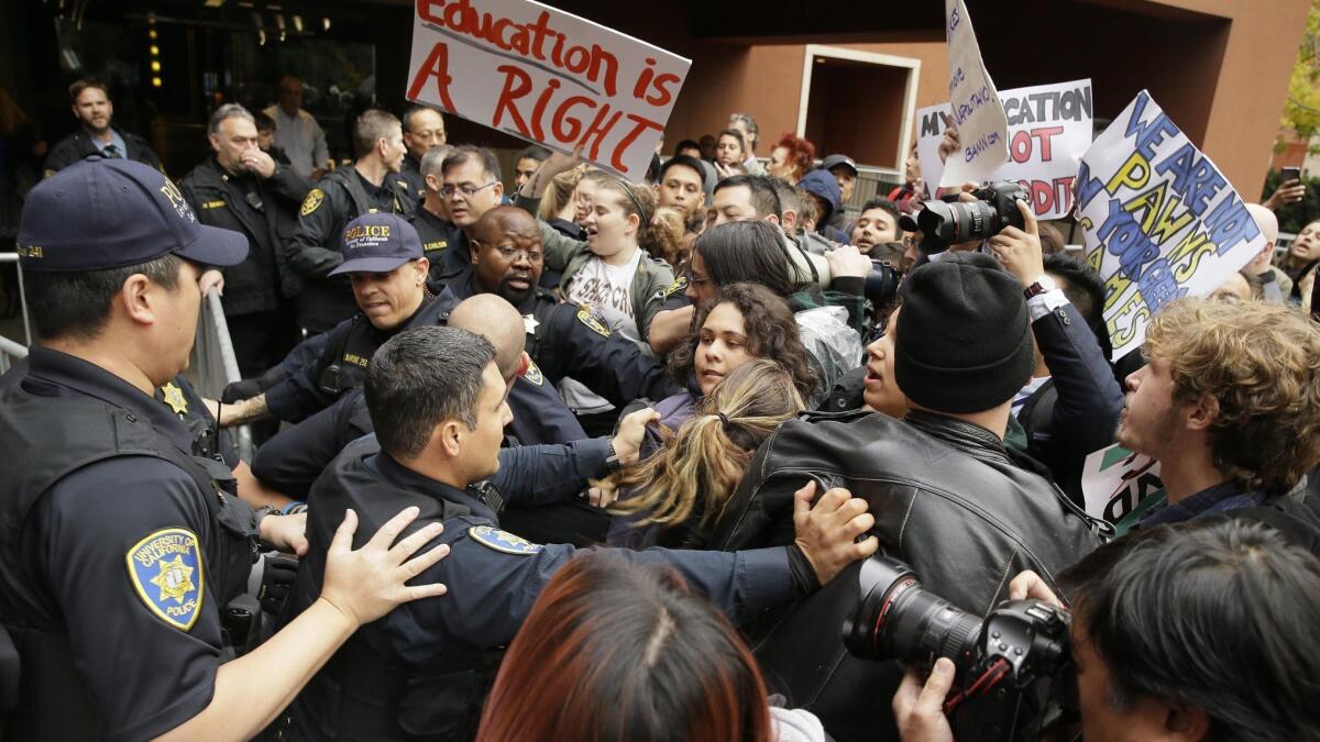 University of California police confront protesters 