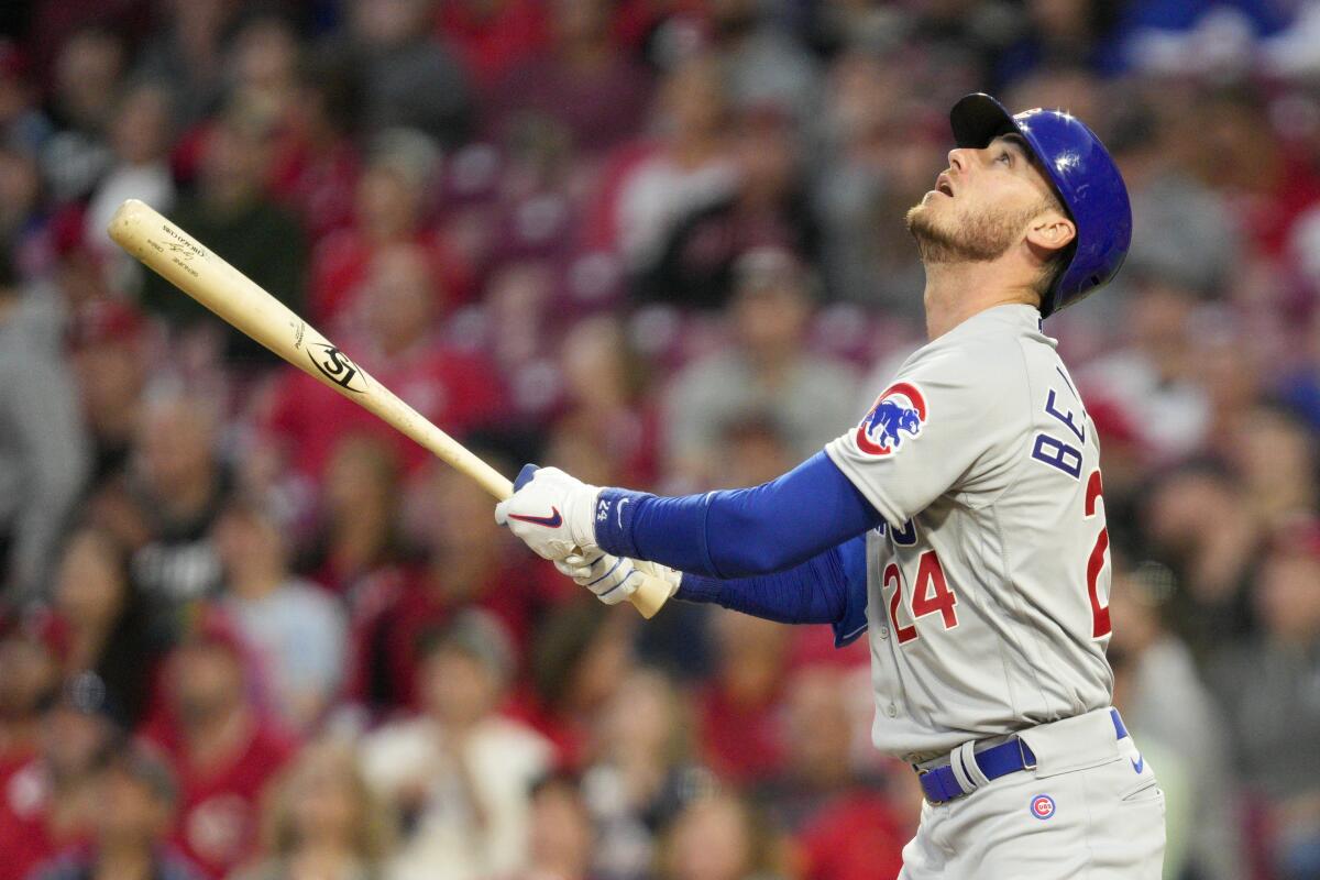 Cody Bellinger hits during a game between the Chicago Cubs and Cincinnati Reds on April 3.