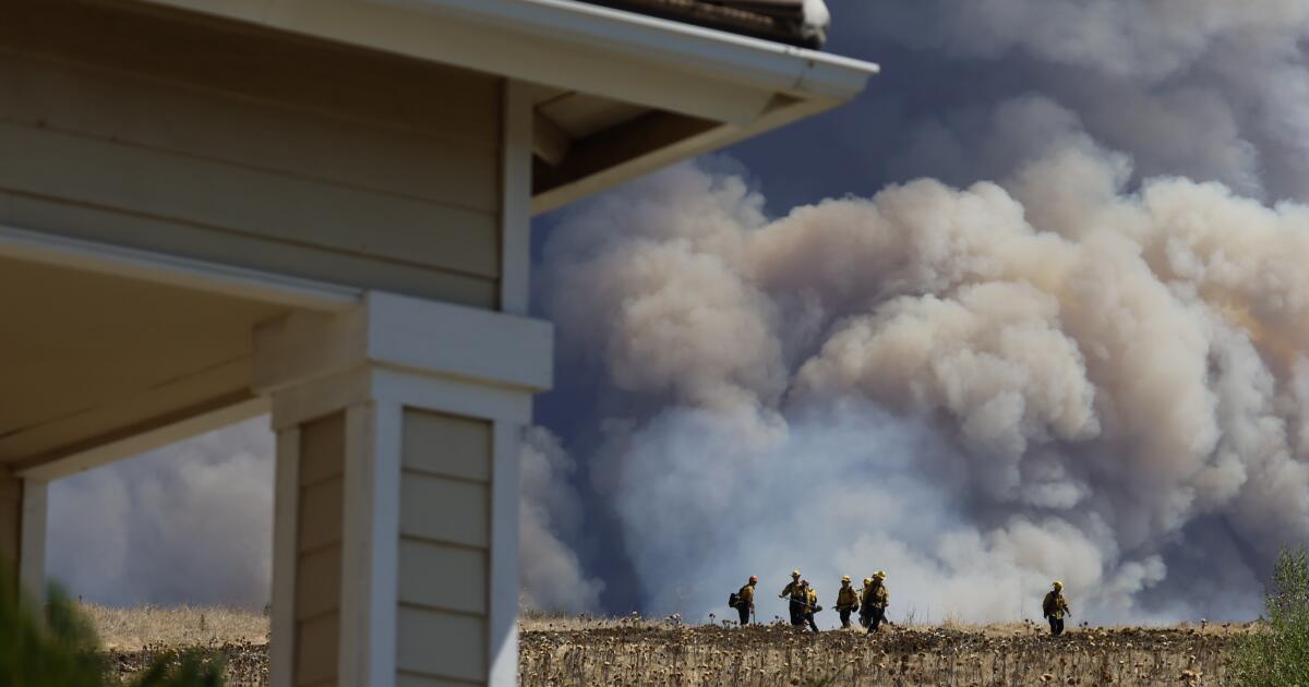 Airport fire injures 13; Bridge fire burns into SoCal mountain resorts