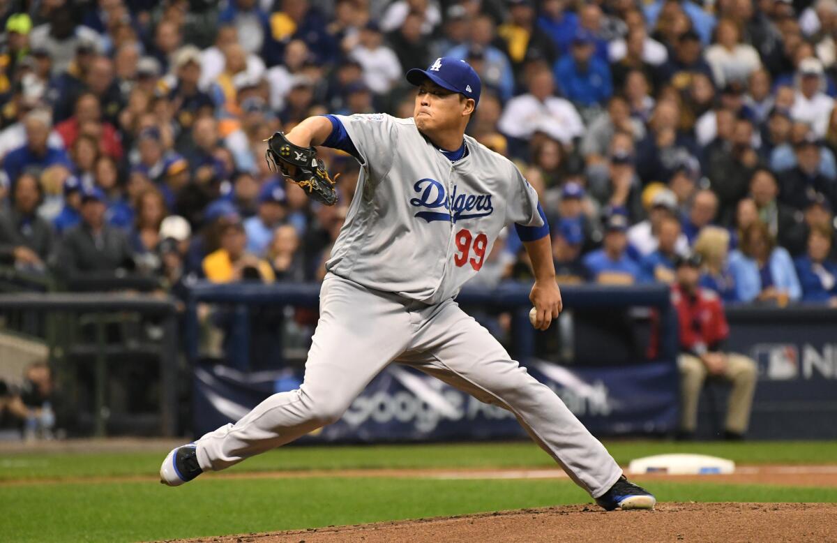 Dodgers pitcher Hyun-Jin Ryu pitches in the first inning of Game 6 of the National League Championship Series against the Milwaukee Brewers at Miller Park.