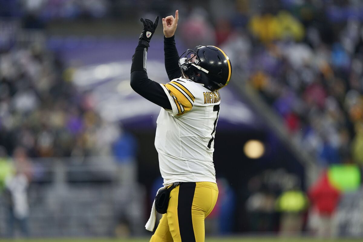 Pittsburgh Steelers quarterback Ben Roethlisberger gestures after throwing a touchdown pass to wide receiver Chase Claypool during the second half of an NFL football game against the Baltimore Ravens, Sunday, Jan. 9, 2022, in Baltimore. (AP Photo/Evan Vucci)