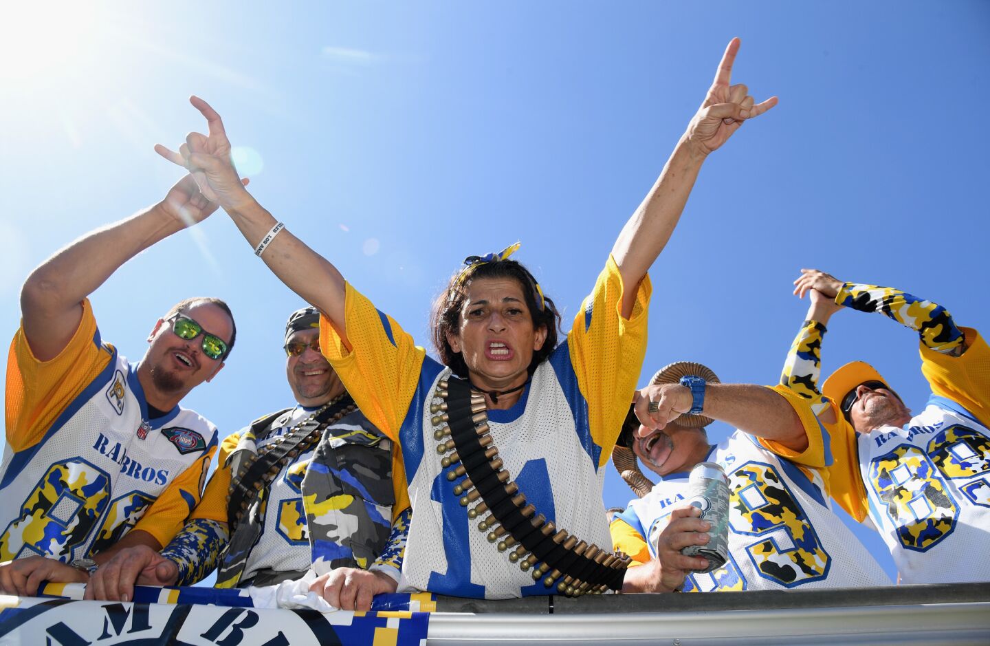 Los Angeles Rams fans cheer on their team before the start of the game against the Los Angeles Chargers at Los Angeles Memorial Coliseum on September 23, 2018 in Los Angeles, California.