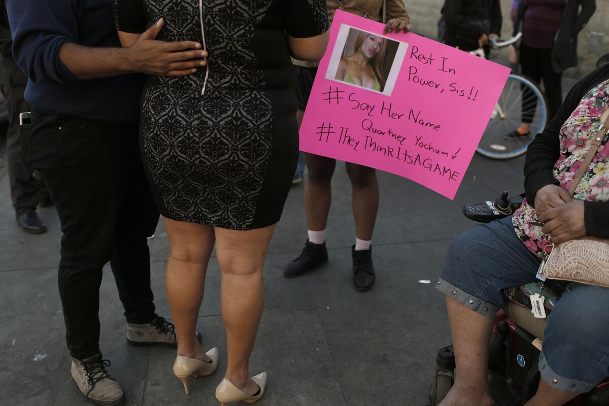 A vigil is held for Kourtney Youchum, a transgender woman who was fatally shot Wednesday while walking outside her home near downtown L.A.'s skid row.