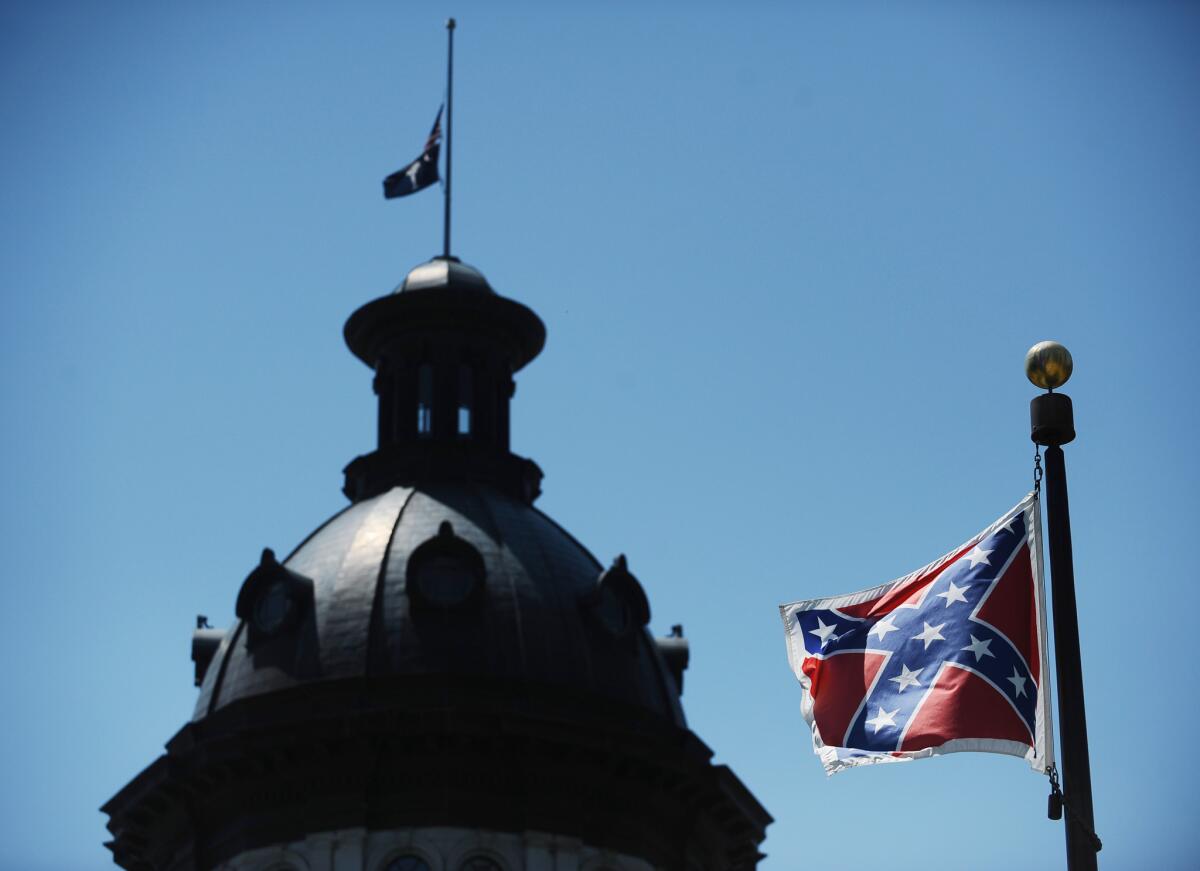 The Confederate flag flies near the South Carolina Statehouse in Columbia in June 2015.