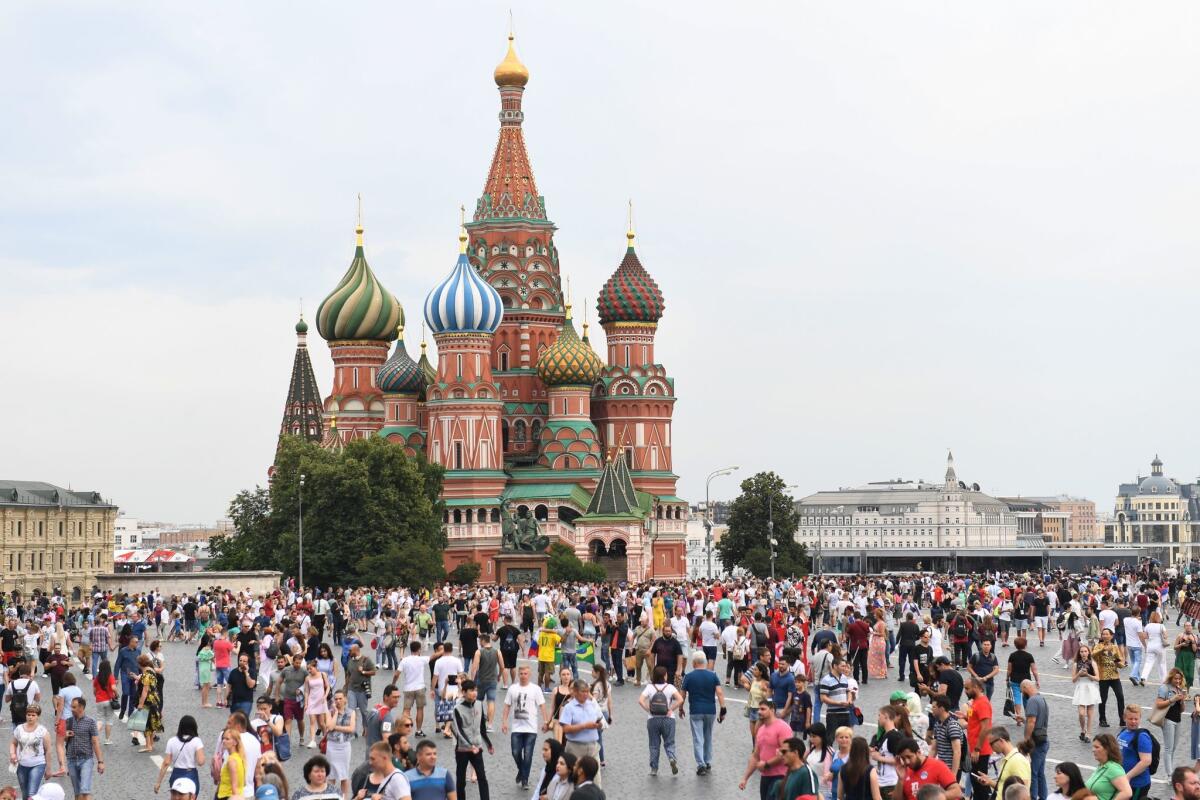 People throng Red Square in front of St. Basil's Cathedral in Moscow on June 24, 2018.