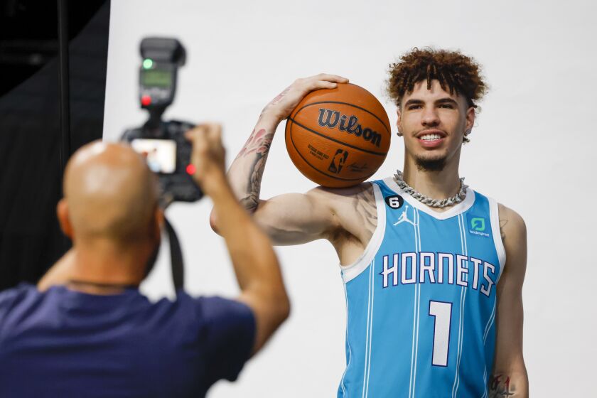 Charlotte Hornets guard LaMelo Ball poses for a photographer during the NBA basketball team's media day in Charlotte, N.C., Monday, Sept. 26, 2022. (AP Photo/Nell Redmond)