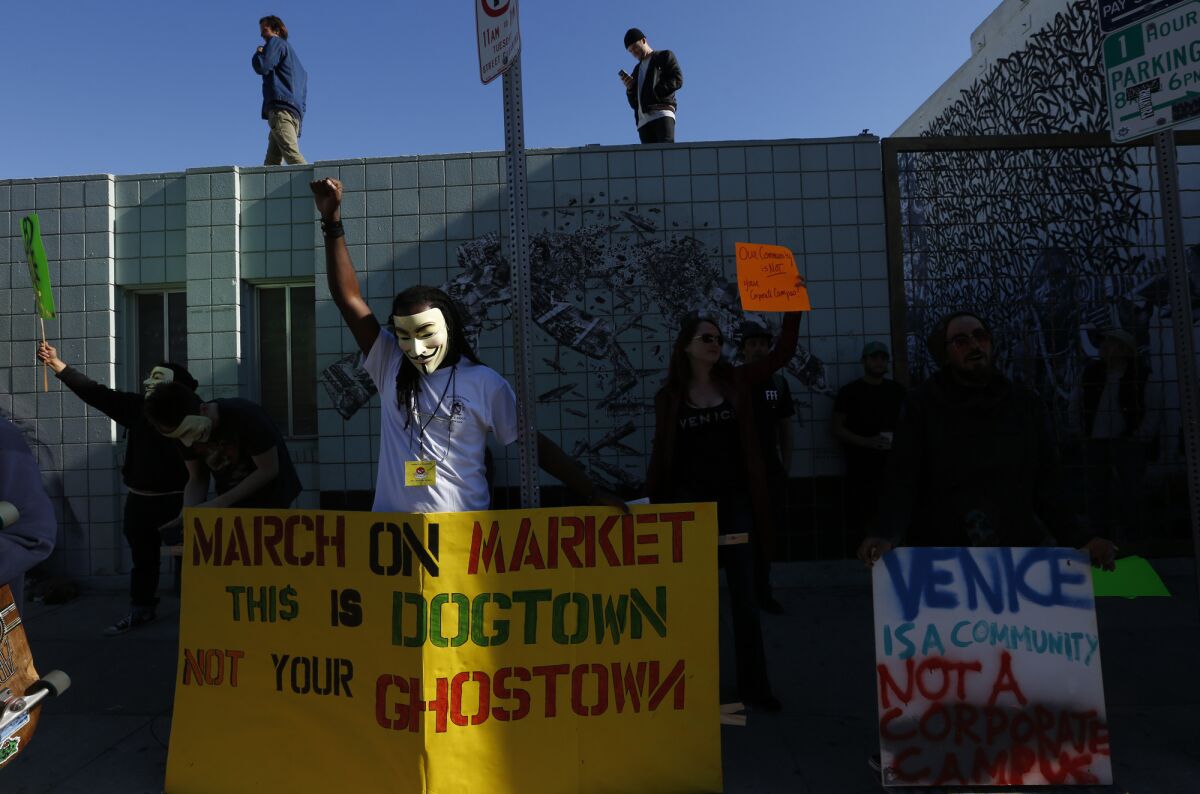 People frustrated by Snap's many offices in Venice protest on the block with buildings where the company's key executives work.