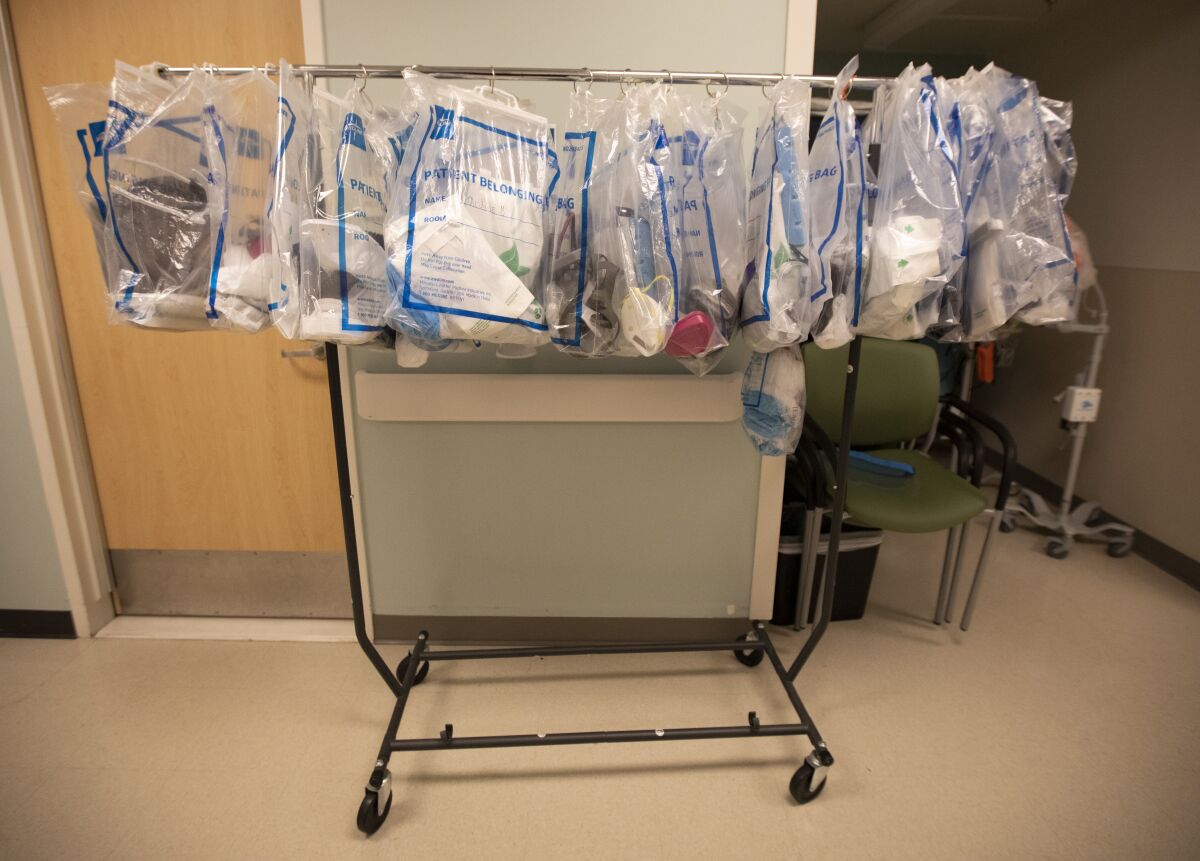 A rack holds bags of personal protective equipment at Martin Luther King Community Hospital in Los Angeles.