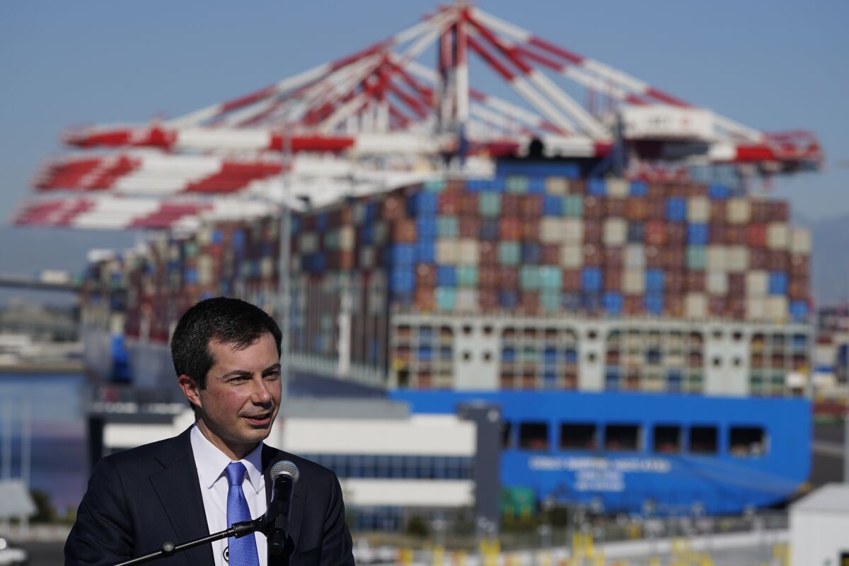 Transportation Secretary Pete Buttigieg speaks during a news conference to discuss the supply chain issues at the Port of Long Beach in Long Beach, Calif., Tuesday, Jan. 11, 2022. (AP Photo/Jae C. Hong)