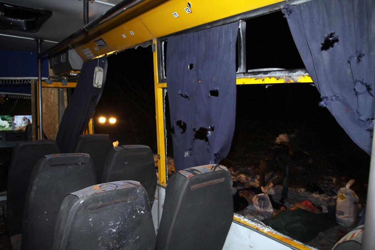 Eleven people were killed when a bus was hit during shelling apparently aimed at a checkpoint manned by Ukrainian forces in Volnovakha, in the eastern region of Donetsk.