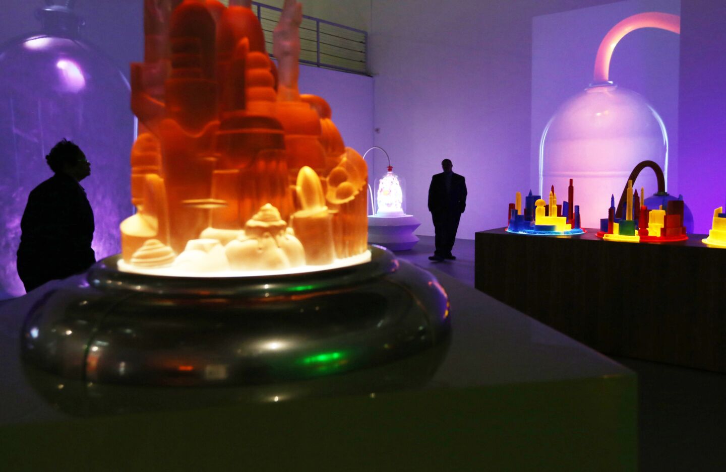 A group of sculptures from Mike Kelley's "Kandor" series, along with video projections, are on display in MOCA's Geffen Contemporary as part of a retrospective on the late L.A. artist's work.