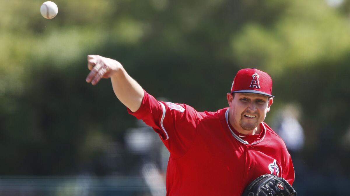 Angels pitcher Trevor Cahill pitches in a spring training baseball game in Glendale, Ariz.