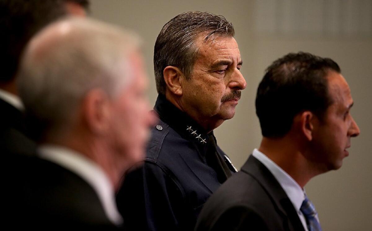 LAPD Chief Charlie Beck and L.A. City Councilman Mitch Englander speak to reporters Monday about the investigation into the death of Cal State Northridge student Abdullah Abdullatif Alkadi, whose body was found over the weekend along the 10 Freeway in Riverside County.