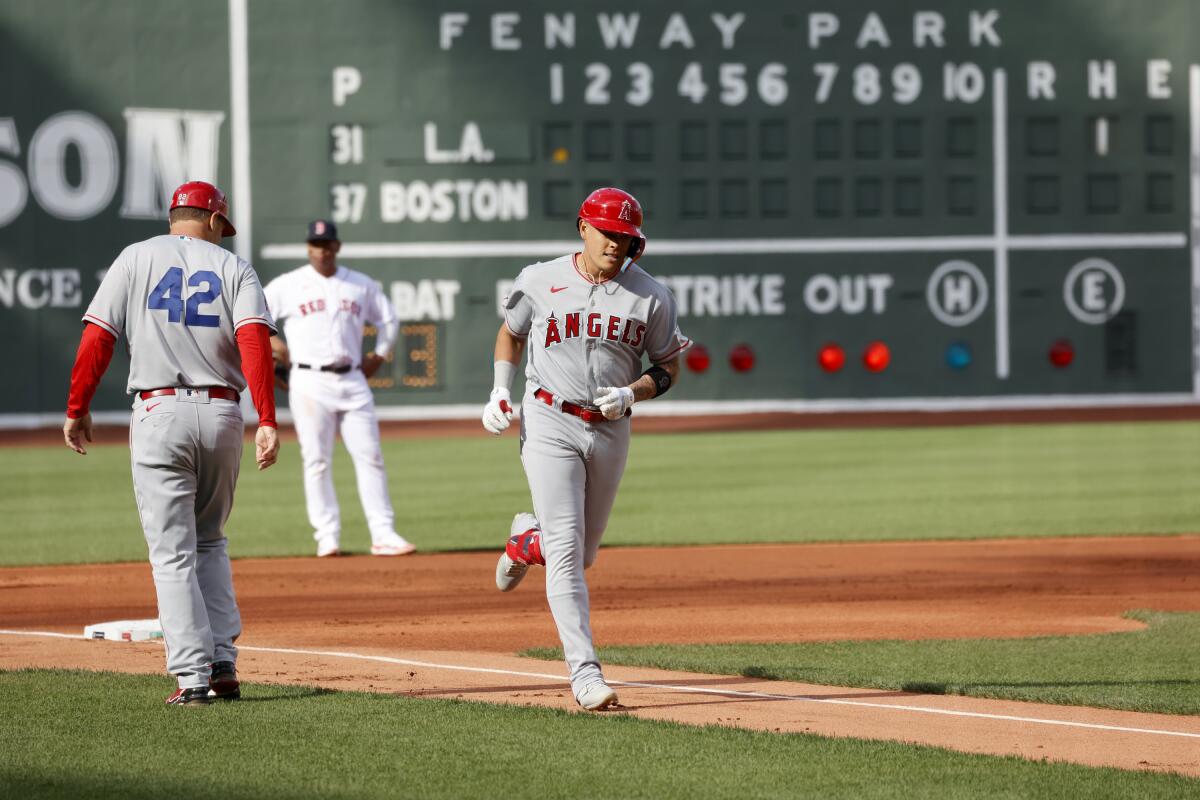 The Angels' Gio Urshela rounds third base after he hit a first-inning grand slam April 15, 2023.