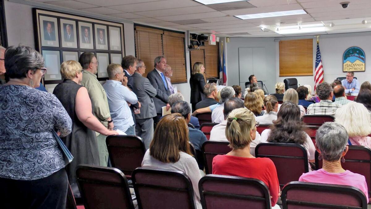 A large crowd turned out for a La Cañada Flintridge planning commission meeting, where a 10-year master plan expansion proposal for Flintridge Preparatory School was up for discussion.