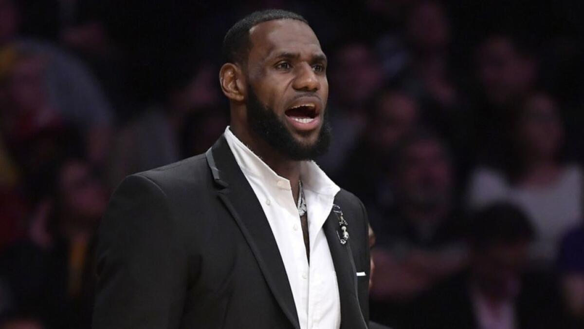 LeBron James stands near the Lakers bench during a game against the New York Knicks on Jan. 4.