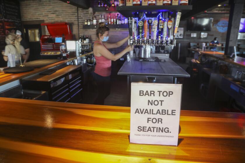 LAKESIDE, CA - SEPTEMBER 24: The bar top is currently not available for seating at Eastbound Bar and Grill on Thursday, Sept. 24, 2020 in Lakeside, CA. (Eduardo Contreras / The San Diego Union-Tribune)