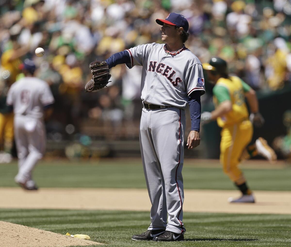 The Angels traded reliever Scott Downs to the Atlanta Braves on Monday.