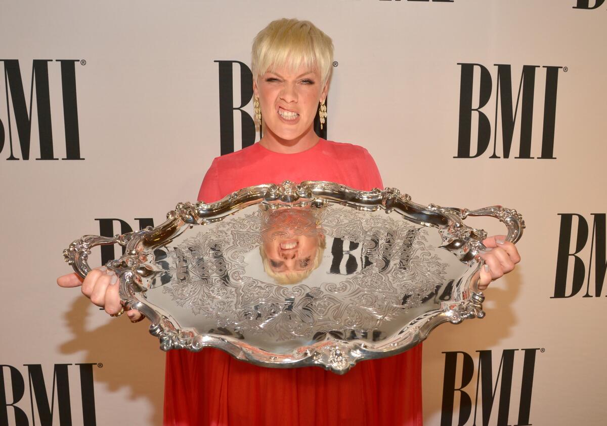 P!nk poses with the BMI President's Award during the 63rd Annual BMI Pop Awards held at the Beverly Wilshire Hotel.