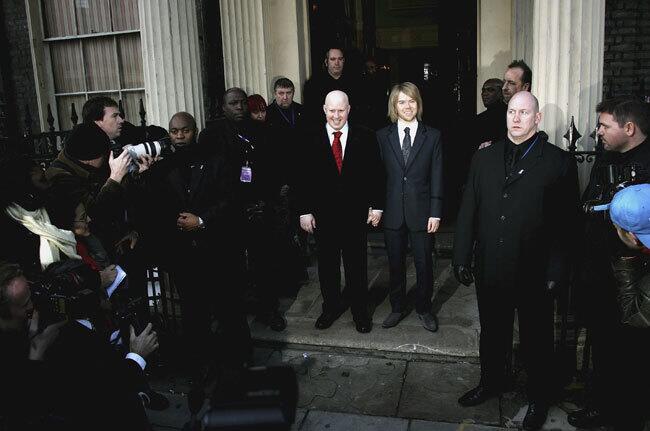 In the United Kingdom, same-sex couples cannot marry, but instead enter into what the government calls "civil partnership." This legal relationship gives couples the same rights as married couples in areas such as tax and employment benefits. PICTURED: Matt Lucas and Kevin McGee pose after their Civil Partnership Ceremony on December 17, 2006 in London, England.