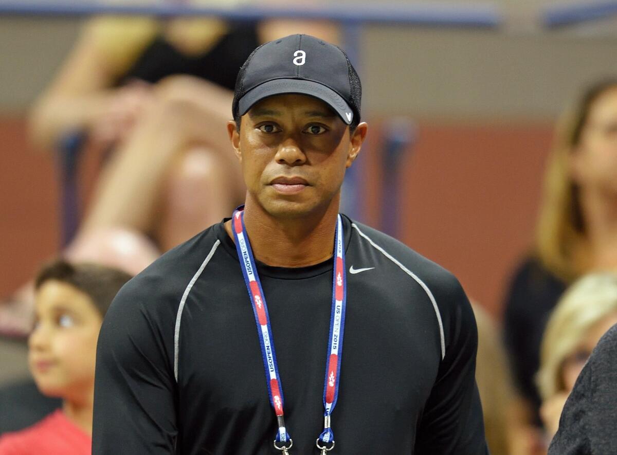 Tiger Woods attends the U.S. Open tennis tournament in New York on Sept. 4, 2015.
