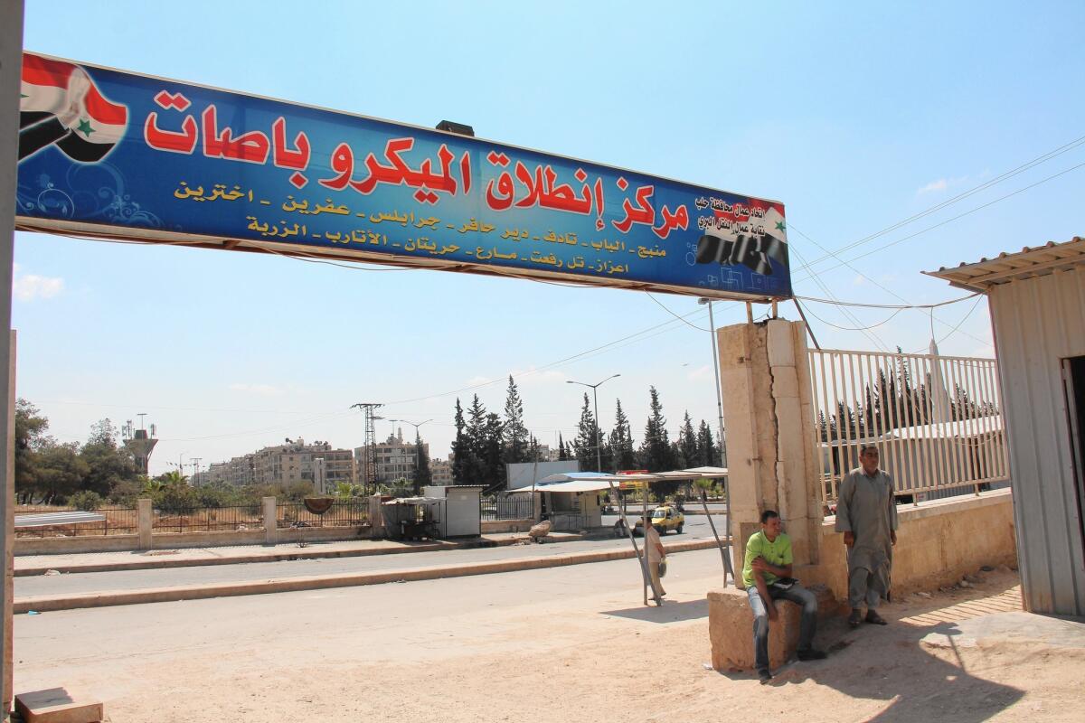 A sign at the entrance to the bus depot in Aleppo, Syria, gives the destinations, almost all of which are held by either Islamic State or rival opposition groups.