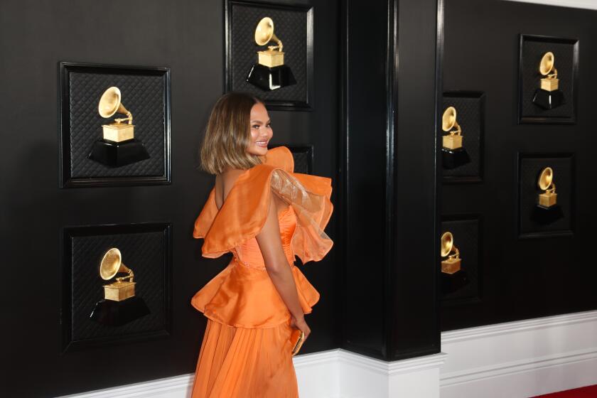 LOS ANGELES, CA - January 26, 2020: Chrissy Teigen arriving at the 62nd GRAMMY Awards at STAPLES Center in Los Angeles, CA.(Allen J. Schaben / Los Angeles Times)