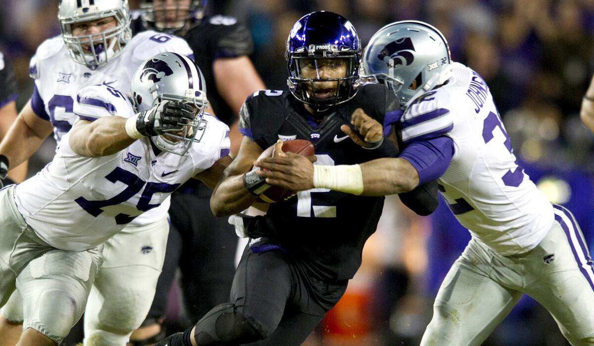 Texas Christian quarterback Trevone Boykin scrambles from the pocket against Kansas State in the first half Saturday.