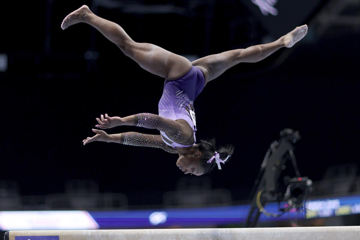 Simone Biles competes on the balance beam at the U.S. gymnastics championship on Friday.