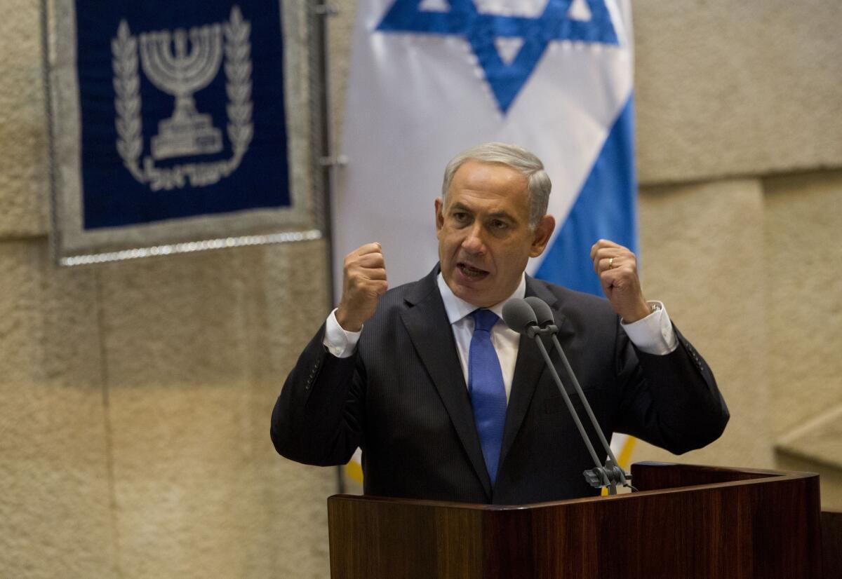 Israeli Prime Minister Benjamin Netanyahu speaks during the opening session of the Knesset, Israel's parliament.
