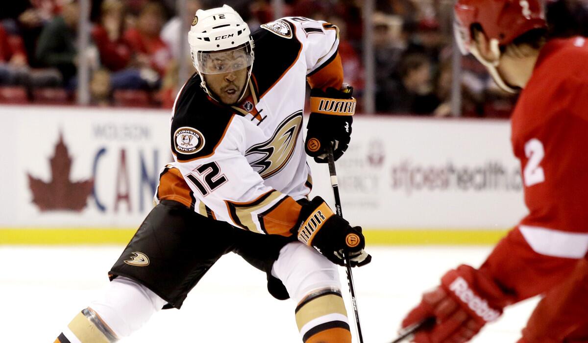 Ducks right wing Devante Smith-Pelly brings the puck up ice against the Red Wings on Saturday.