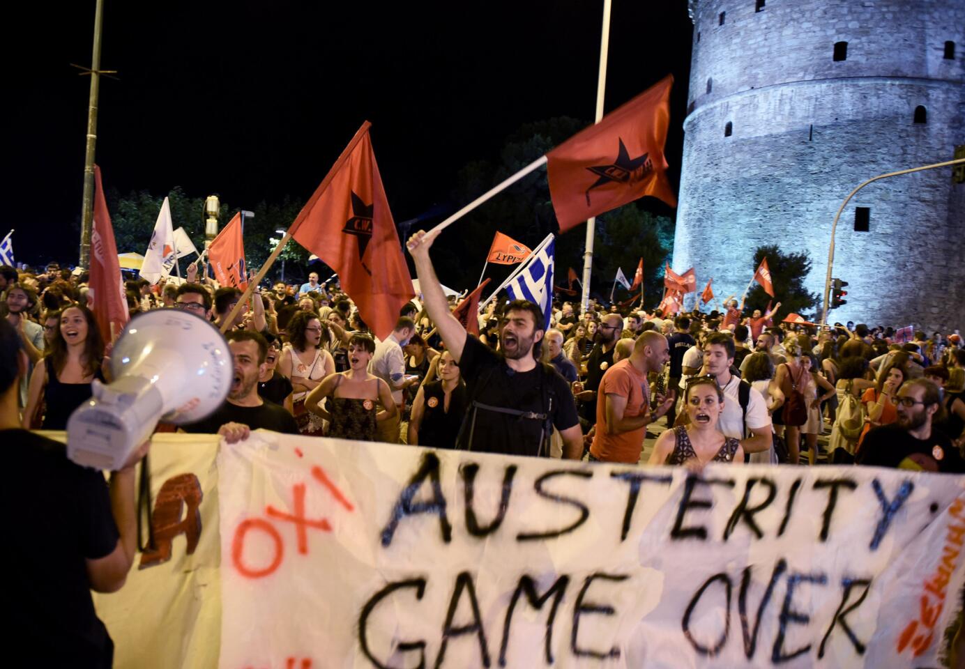 Opponents of the Greek bailout deal celebrate in the northern port city of Thessaloniki.