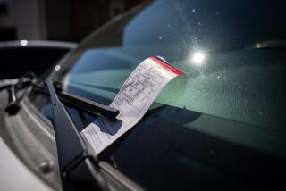 Los Angeles, CA - August 25: A parking ticket on the windshild of a vehicle on Barrington Ave. in Los Angeles on Friday, Aug. 25, 2023 in Los Angeles, CA. (Jason Armond / Los Angeles Times)