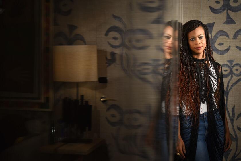 MANHATTAN, NEW YORK, DECEMBER 8, 2018 Hannah Beachler, the production designer for the film Black Panther, who created the fantastical land of Wakanda, is seen at the Crosby Street Hotel in Manhattan, NY. Beachler is wearing a beaded top, made in Nairobi, and the beads are connected to the Maasai tribe, by designer Sophia Omoro, whose brand is Odaomo. 12/8/2018 Photo by Jennifer S. Altman/For The Times