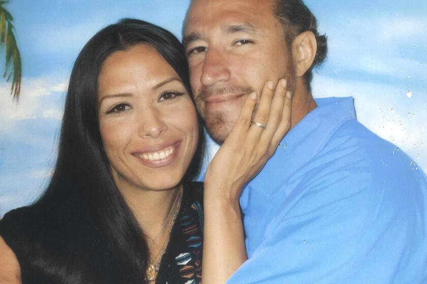 This undated photograph, provided by the law firm Allred, Maroko & Goldberg, shows Christina and Carlos Cardenas. (Allred, Maroko & Goldberg via AP)